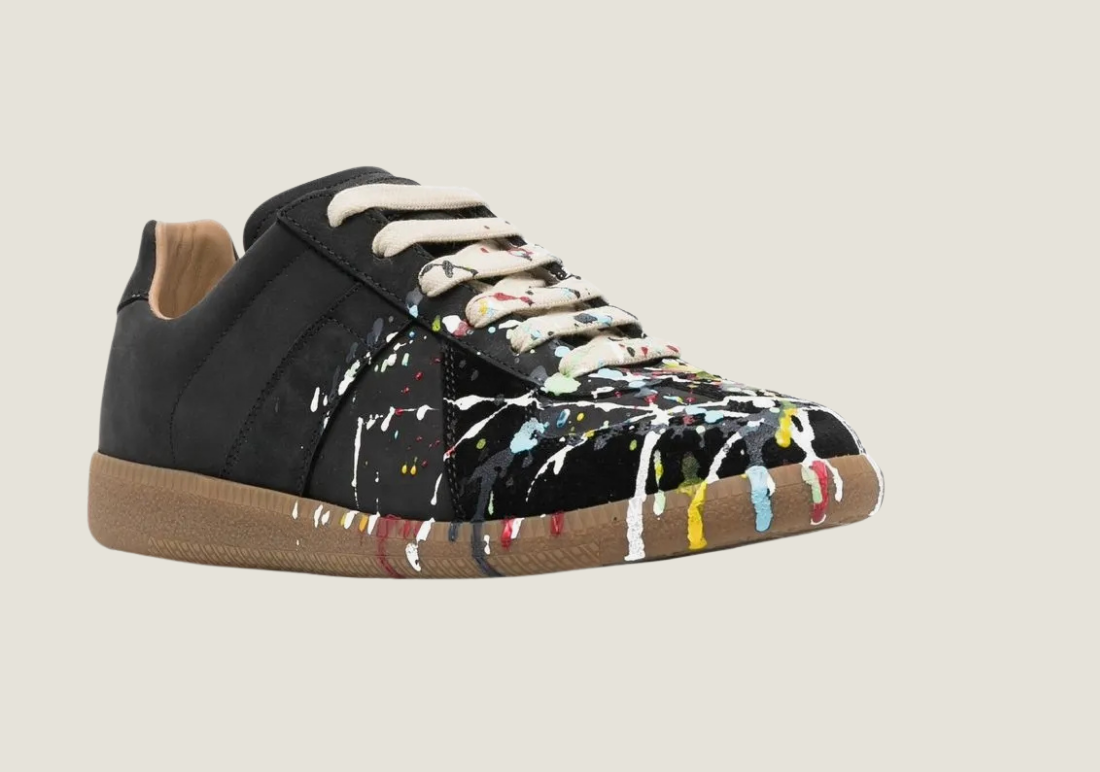 MM  nubuck leather and velour featuring a paint splatter design.